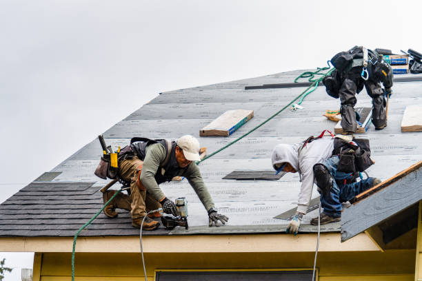 Professional Gutter Installation technician working in Hays, KS